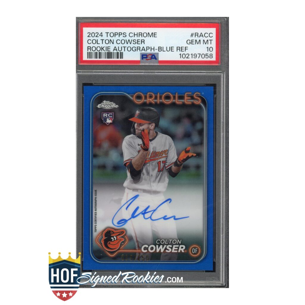 PSA-graded 2024 Topps Chrome Colton Cowser Orioles rookie autographed baseball card in a protective case, blue ink autograph visible on the card edge.