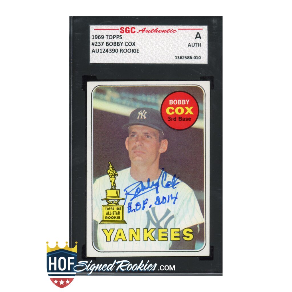 Autographed Bobby Cox rookie card in a binder sleeve, Yankees 3rd Base with SGC Authentic label.