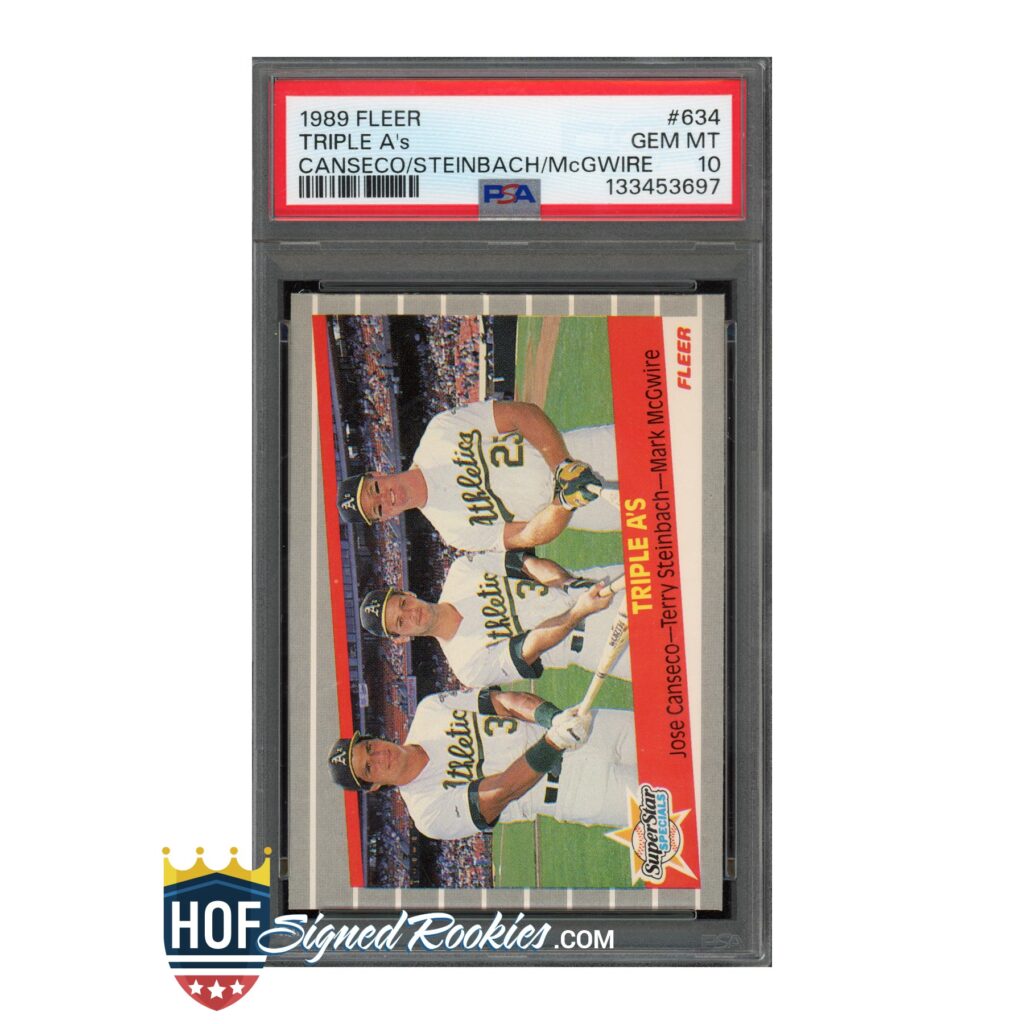 Baseball card in protective case featuring 1989 Fleer Triple A's Canseco/Steinbach/McGwire with PSA label on top edge.